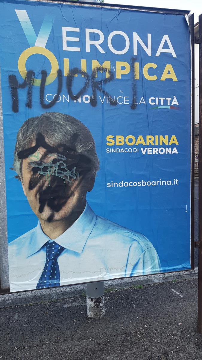 Manifesto vandalizzato Sboarina Verona Olimpica