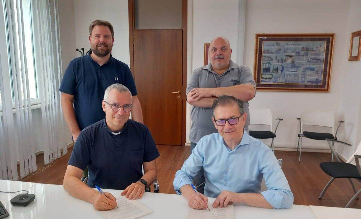 Firma Emporio Caritas San Giovanni Lupatoto solidarietà